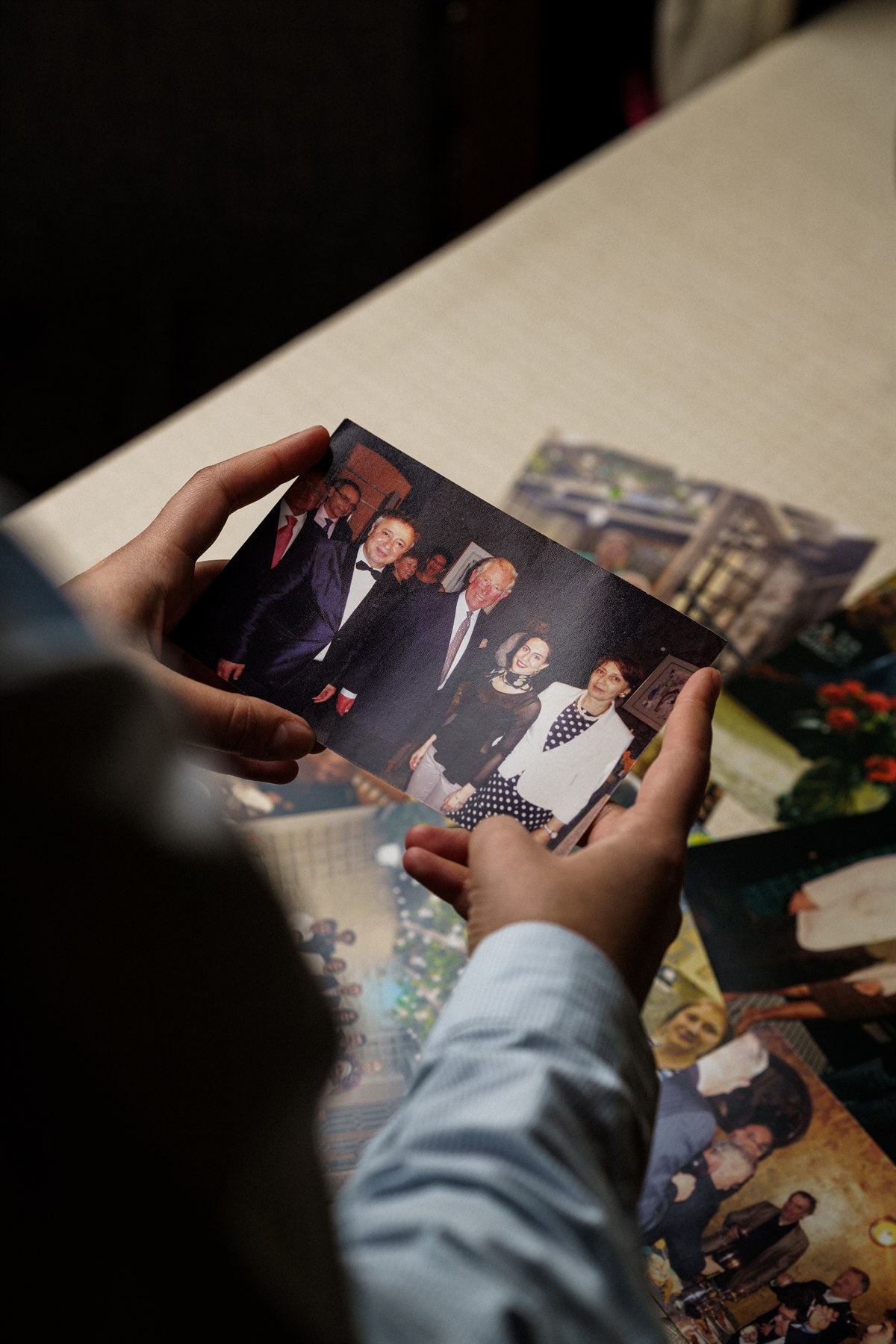 Person holding a historical Dolmama photograph